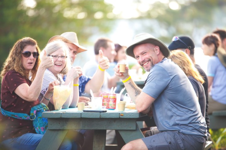 a group of people sitting at a table