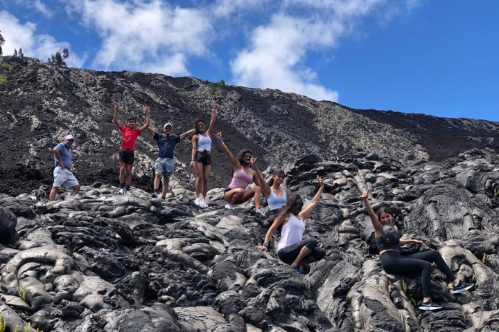 a group of people in a rocky area
